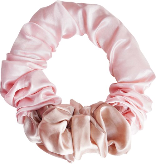 A soft, pink satin hair tie or scrunchie with a ruffled design.