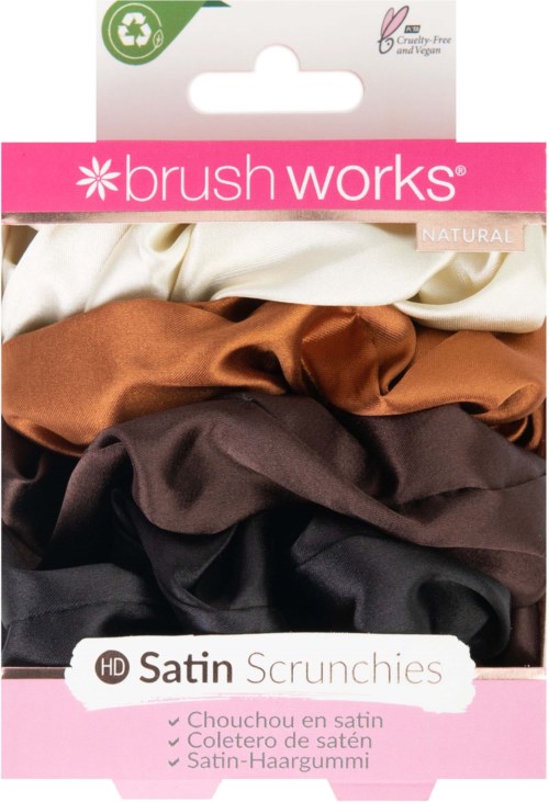 A package with three satin scrunchies in cream, brown, and black on pink and white background.