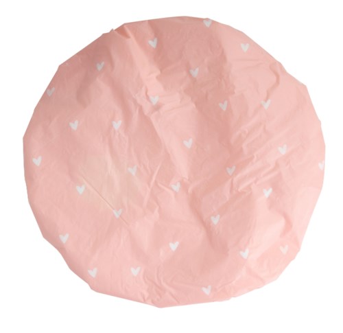 Roze Rimpelig papier met witte hartjes verspreid over.
