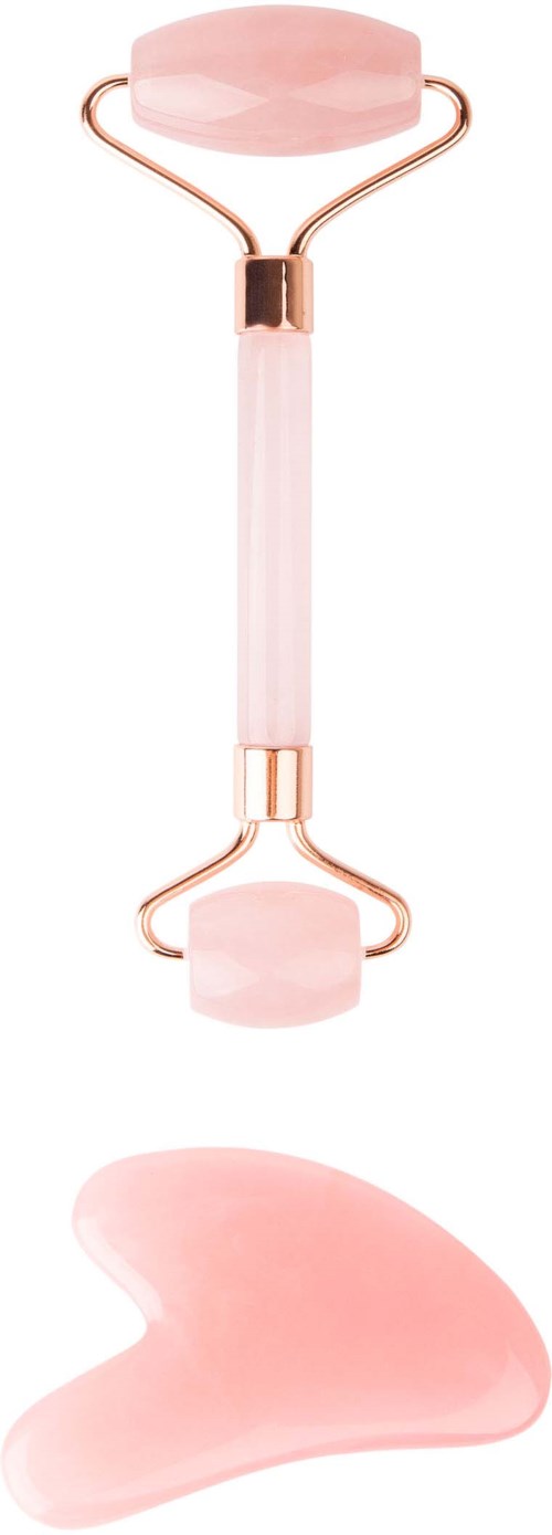 Ein pinkes Gesichtsroller mit zwei Steinen und einem kleinen Klecks rosa Serum oder Gel darunter.