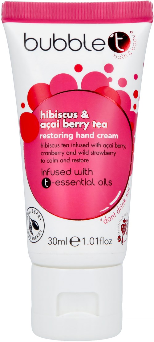 En tube med håndkrem kalt Bubble t, med rosa og hvit design, inneholder hibiskus og acai bær te ingredienser.