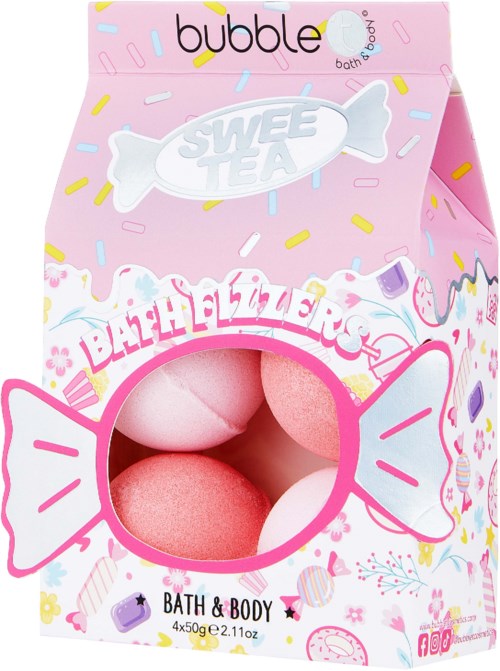 Pink and white bath bombs inside a colorful box with candy and sweet theme.
