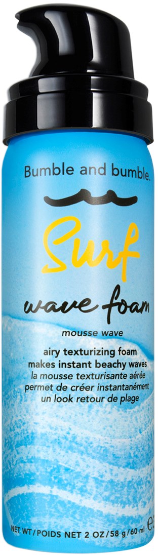 A blue bottle with a black pump shows Bumble and Bumble Surf wave foam for hair, designed to make hair look like waves.