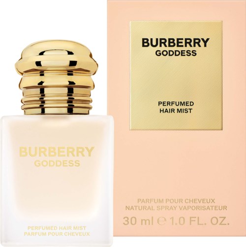 Burberry Goddess parfymdusk for hår i flaske med gullhette, ved siden av den rosa og beige emballasjeboksen.