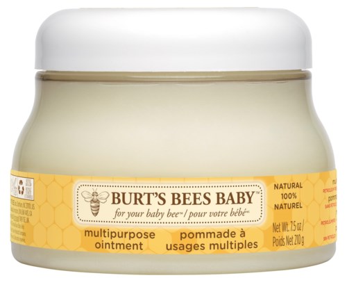 Ett burk Burt's Bees Baby mångsidig salva med en gul och honungskakdesign på etiketten. Den är naturlig och för bebisar.