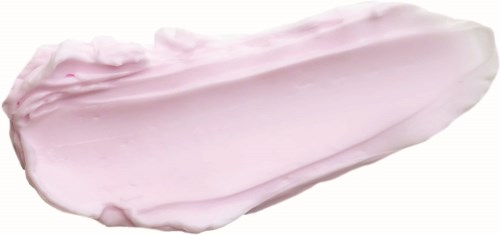 En klump ljusrosa grädde eller lotion som är utbredd, slät med lätt vågighet, på en vit bakgrund.