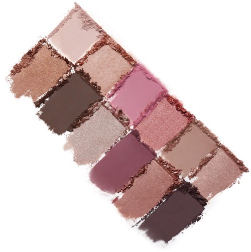 En palett med tolv rosa-, bruna- och beigeansiktsfärger i rektangulära fack. De är arrangerade diagonalt.