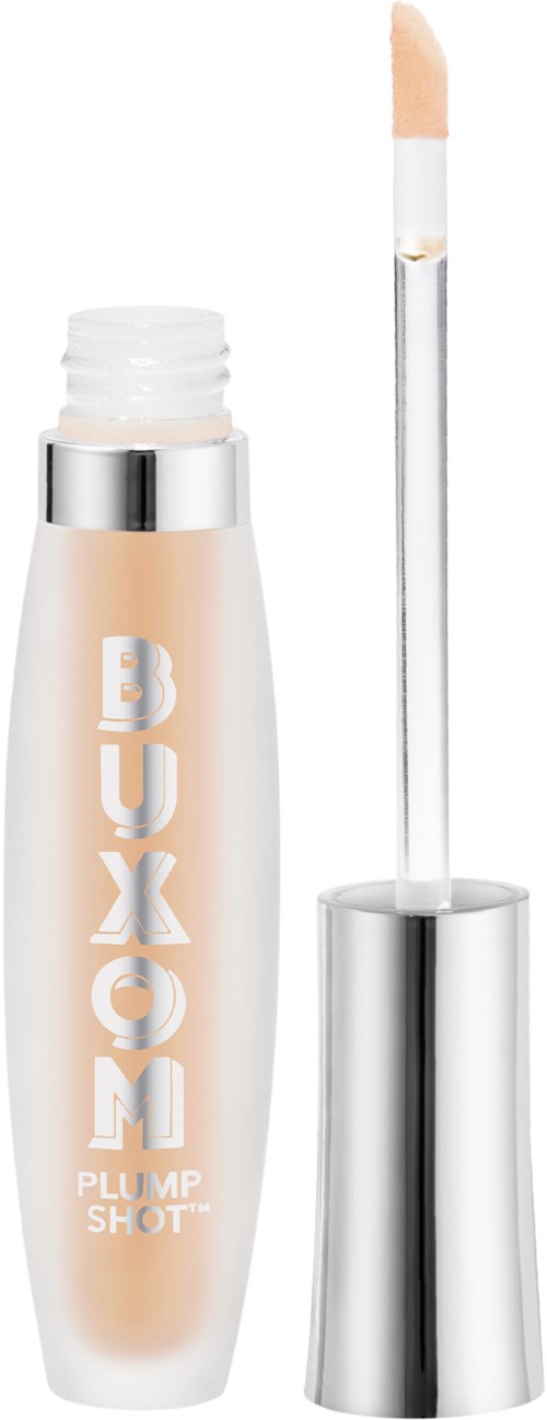 En beige flytande concealer i ett vitt och silver rör med applikatorpinnar.