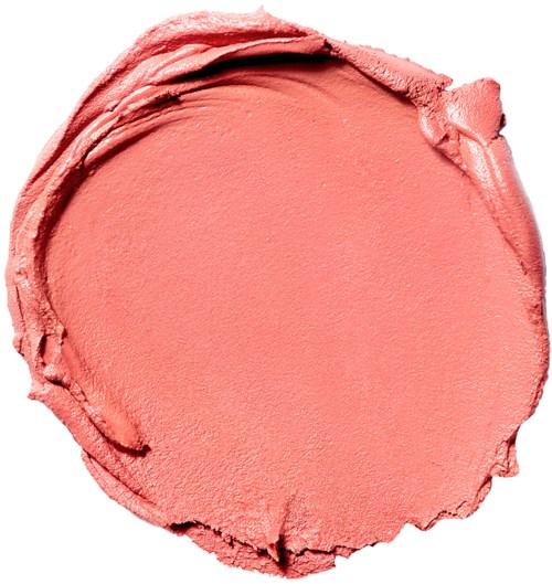 En rund, rosa sminkrouge med jevn, kremet tekstur og litt ru kant.