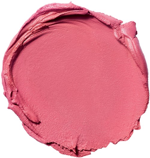En rund klatt av rosa leppestift eller maling med ru kanter og en glatt, blank overflate.