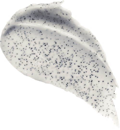 A white feather with black speckles and a pointed tip.