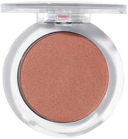 A round, peach-colored makeup blush with a clear lid. The blush surface is smooth and shimmery.