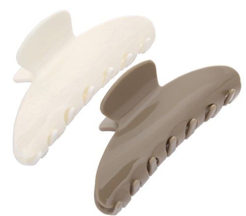 Two plastic hair clips in white and brown colors with small teeth for holding hair.