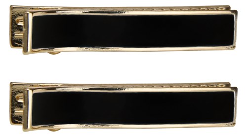 Two gold and black hair clips are stacked and aligned.