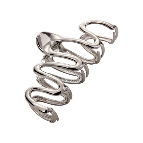 En glänsande metallhårklämma med vågig design och en liten clamp i ena änden.