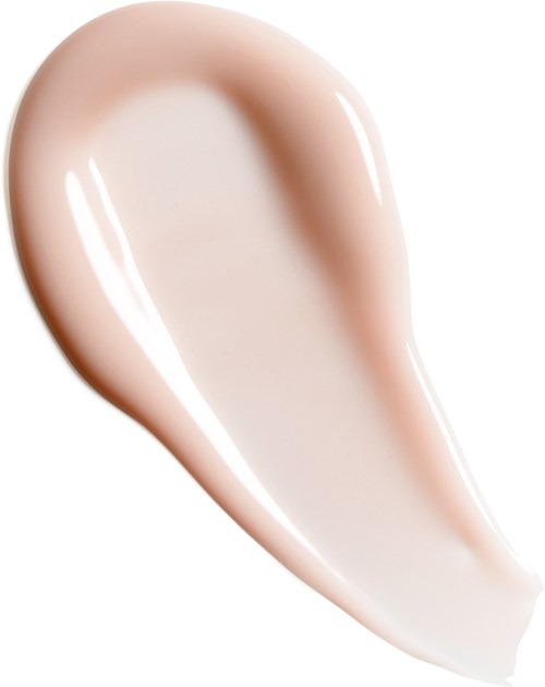 A drop of beige-colored liquid with a shiny surface and smooth edges.