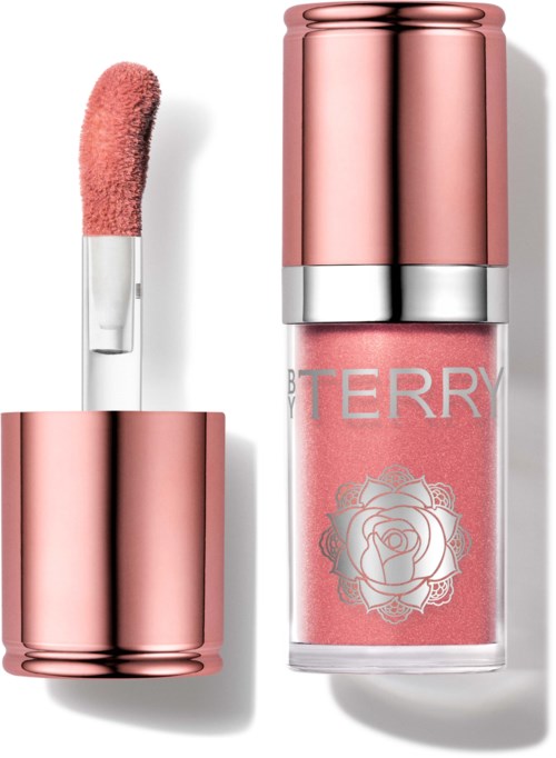 Pink lip gloss with a silver and pink container, open with applicator stick leaning on it, featuring a rose logo.
