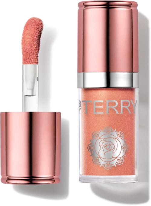 Pink lip gloss with a silver and rose gold container, and a rose design on the bottle.