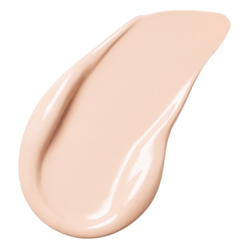 En beige farget krem eller lotion i en glatt, virvlet form.