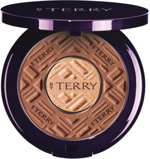 Powder compact with a purple lid featuring the BY TERRY logo, embossed pattern, and the same logo in the center.