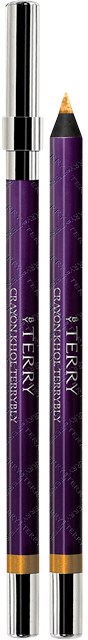 Lila eyeliner-penna med guld- och silverdetaljer, märkt TERRY, med en vässad spets.