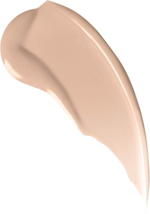 A streak of beige liquid, smooth and curved, likely foundation or makeup cream.