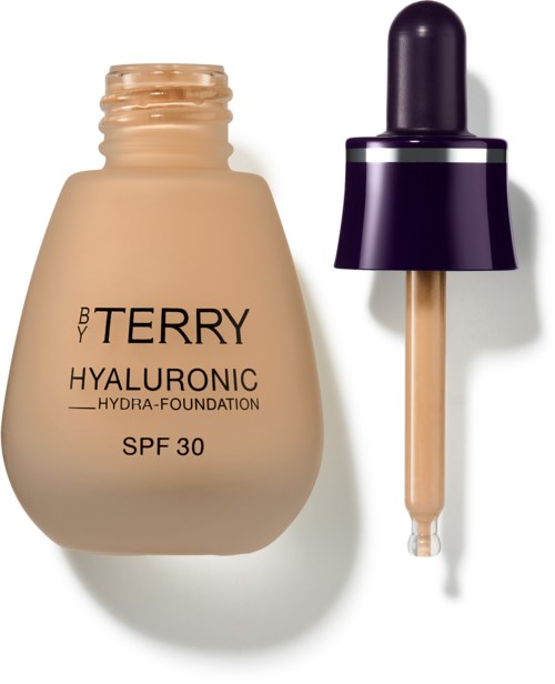 En beige flaske med hyaluronsyregrunnlag med dråpeteller og SPF 30 beskyttelse.