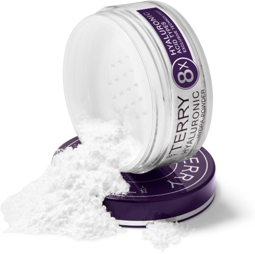 Hair powder container with white powder spilling out, purple lid, and label mentioning hydrolyzed keratin and hyaluronic acid.