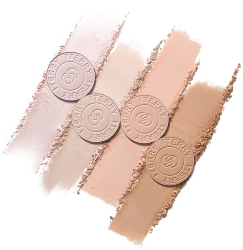 Four makeup foundation swatches and four round embossed seals with a swirl logo. The shades range from light to darker skin tones.