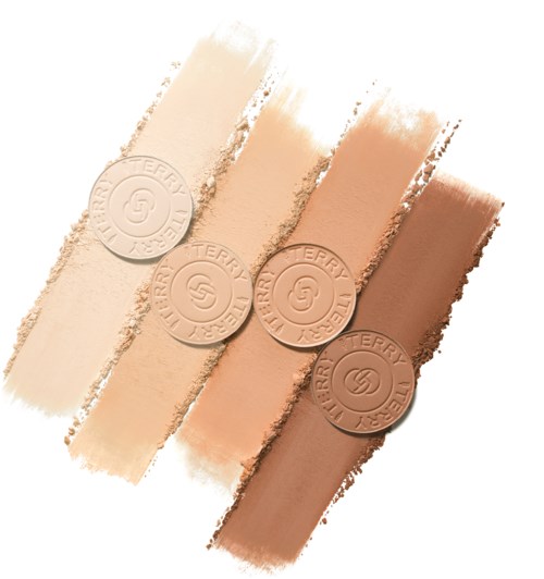 Four makeup swatches with embossed round seals showing different shades from light to dark.