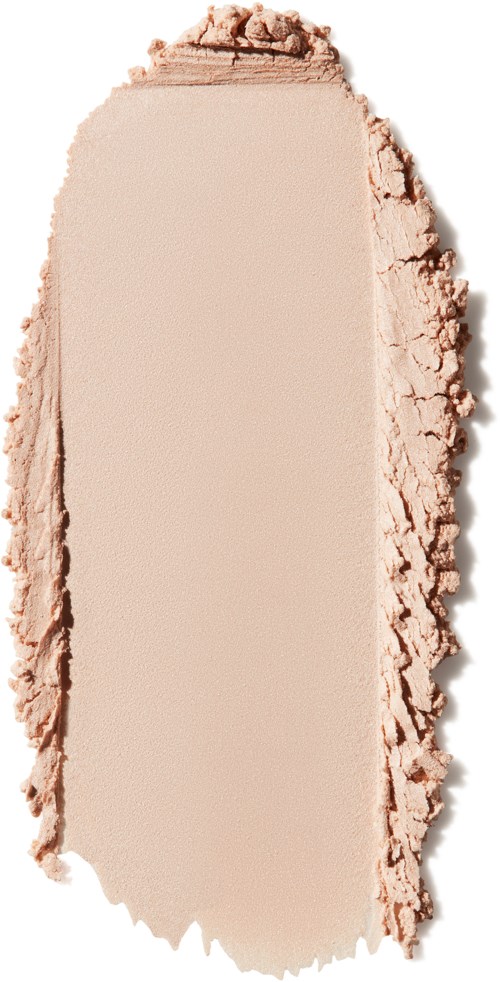 En beige puder med ojämna, grova kanter, troligen makeup eller ansiktspuder.