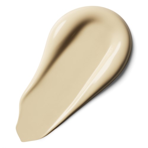 A beige or light cream substance with a smooth, glossy surface, shaped like a teardrop or elongated blob.
