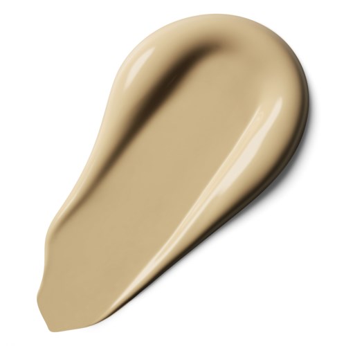 A beige smear or spread with smooth, shiny surface and curved shape.