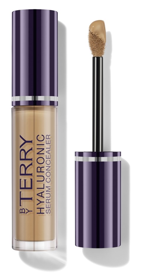 Lip gloss with a purple and silver tube, labelled 'By Terry Hyaluronic Serum Concealer', and its applicator wand.