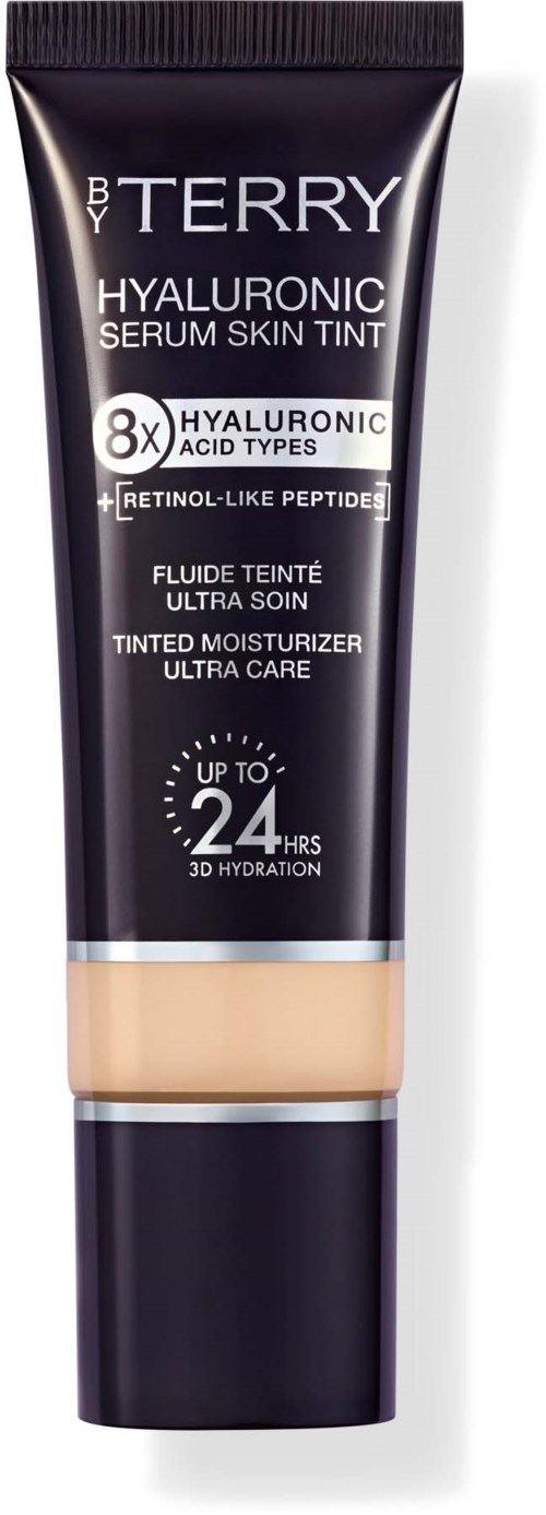 Tube of By Terry Hyaluronic Serum Skin Tint with black and beige packaging, highlighting skin care benefits and hydration for up to 24 hours.