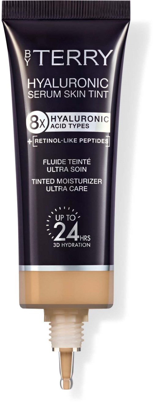 Tube of tinted moisturizer with a beige shade, labeled by By Terry, hyaluronic acid, and 24-hour hydration claims.