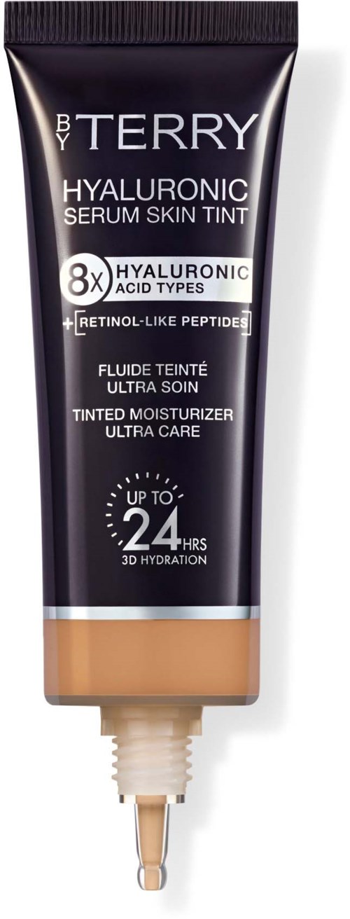 Tube of tinted moisturizer with a beige shade and label indicating hyaluronic acid and up to 24 hours hydration.