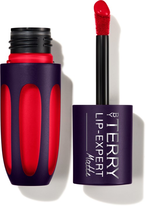 Röd läppstift med lila och röd behållare, öppen med läppstiftet synligt, etiketten säger 'TERRY BY LIFE EXPERT Magic Lipstick'.