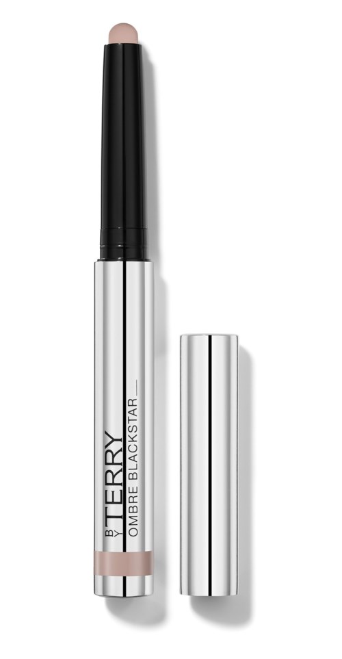 A dual-ended cosmetic product with a beige and black stick, labeled as Blackberry Ombre. The cap is silver.