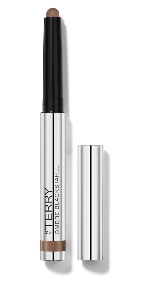 A pen-like makeup stick with black and silver parts, labeled BERY and OMRE BLACKSTAR.