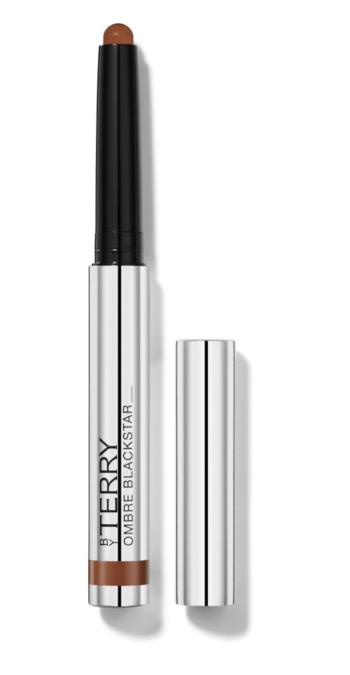 Brown eye pencil with a black cap, labeled "BY TERRY NUMBER BLACKSTAR" on a white body.