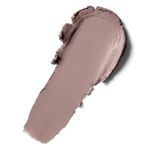 A smear of light beige cream or makeup on a white background.