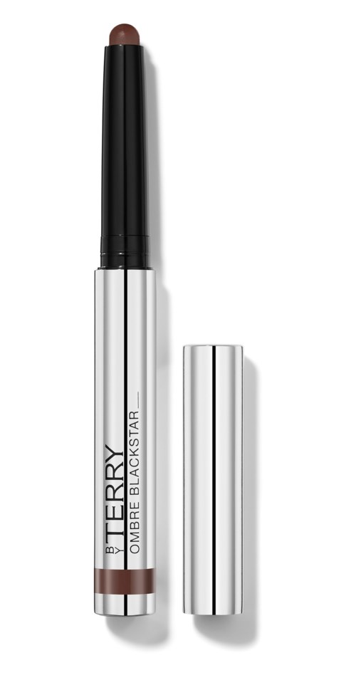 A brown lip pencil with a black cap, labeled "By Terry Ombre Blackstar."