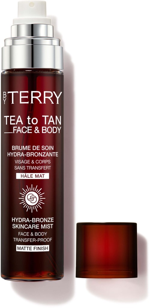 A tall brown bottle with a silver pump, labeled 'Tea to Tan', and a small brown cap next to it.