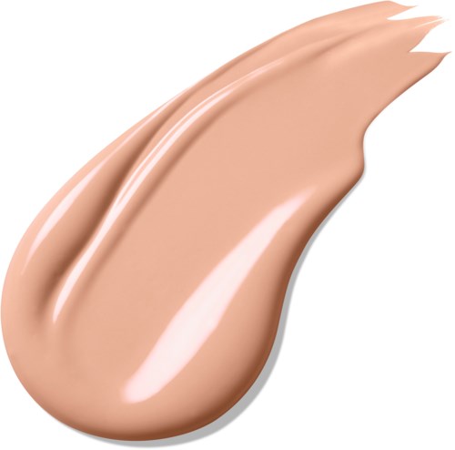 En klutt av beige foundation eller concealerkräm med glansig textur och streck.
