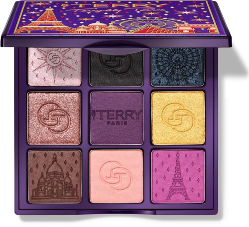 En makeup-palette med ni farverige øjenskygger og et dekorativt Paris-tema lågdesign.