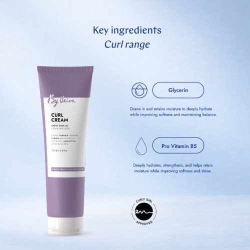 A purple and white tube of curl cream with key ingredients Glycerin and Pro Vitamin B5, on a light blue background.