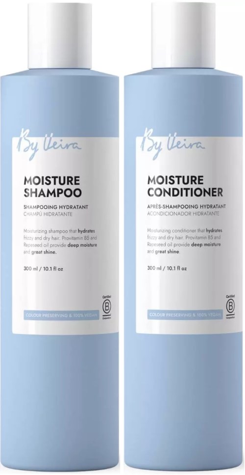 Two light blue bottles of hair care products, one labeled as Moisture Shampoo and the other as Moisture Conditioner.