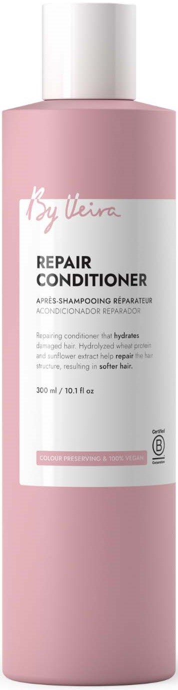 A pink bottle of repair conditioner with a white cap and label, featuring the brand name By Ilera and product details.