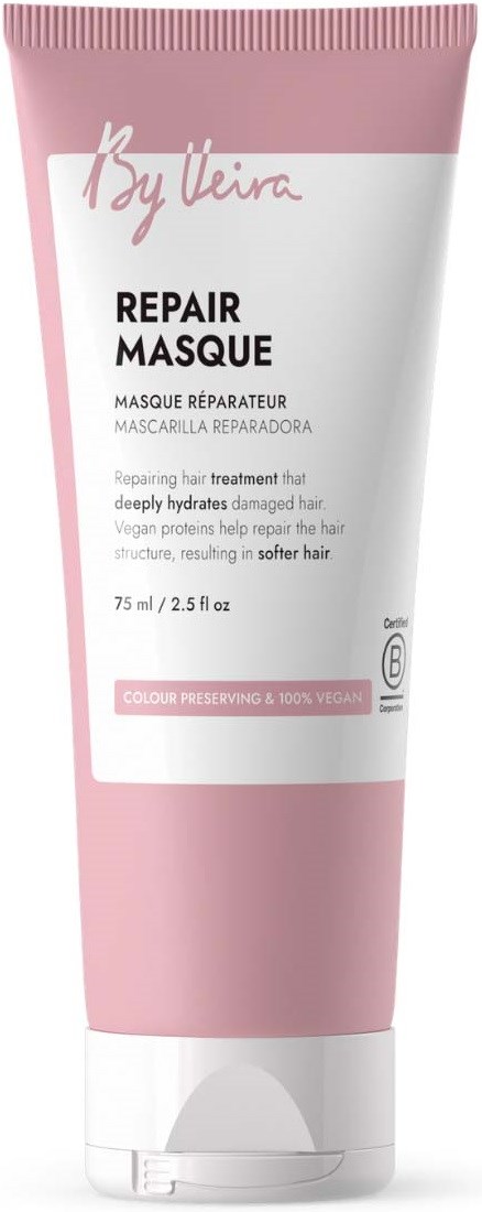Pink tube of repairing hair mask with white label and text that says Repair Masque.